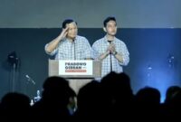UNGGUL QUICK COUNT: Pasangan nomor urut dua Prabowo Subianto Gibran Rakabuming Raka saat menyampaikan pidato di Istora Senayan setelah unggul dalam quick count sejumlah lembaga survei.